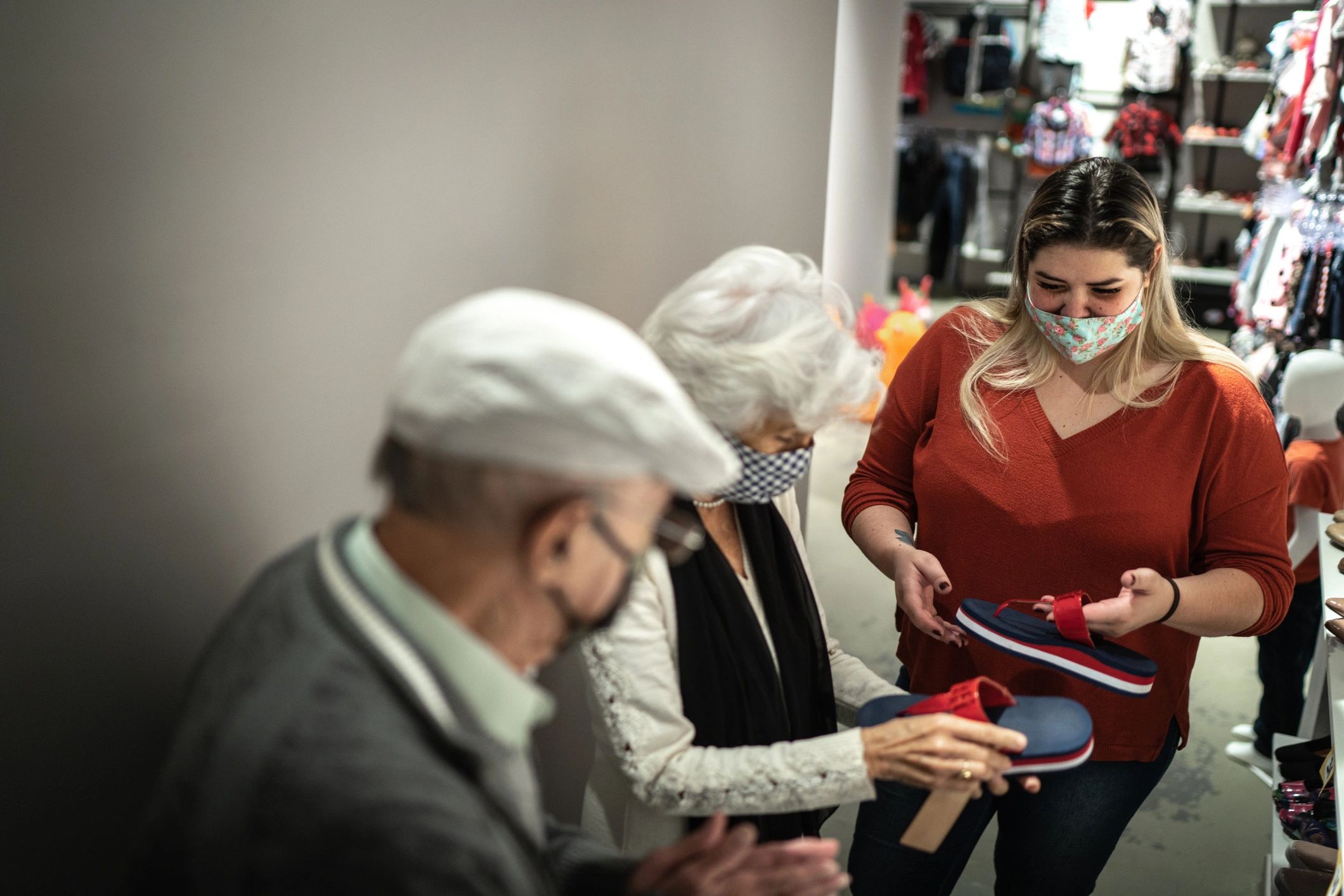 Retail store team assisting customers during store opening